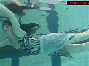 Blackhaired cutie Irina underwater